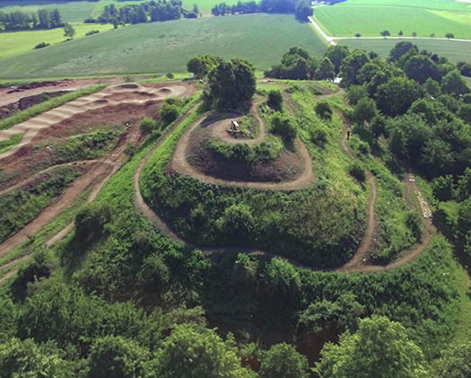 Aerial view of Herrieden Bike Park with trails on the hill